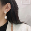 Universal earrings from pearl solar-powered, simple and elegant design