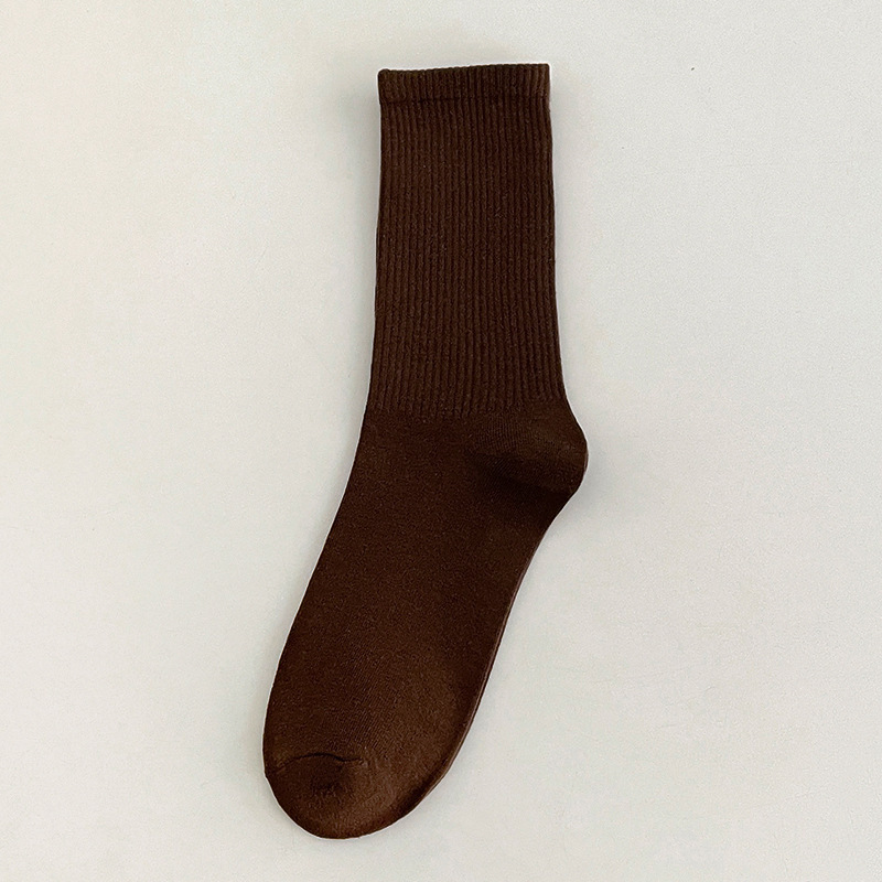 色の靴下の子供の中の筒の靴下のinsの潮の春秋の薄い金のキャンディーの色の秋冬の綿の質のバラの赤い純色のストッキングの靴下