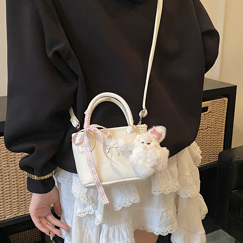 Bolsa de balde coreana para niñas estilo extranjero simple color sólido mini bebé bolsa de cesta de verduras 2026 nuevo bolso para niños