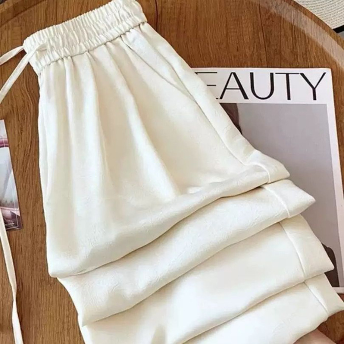 Nuevos pantalones de piernas anchas acéticas de estilo nacional brillo transpirable para mujeres 2025 nuevos pantalones de sandallas delgados impresión de seda de hielo satén