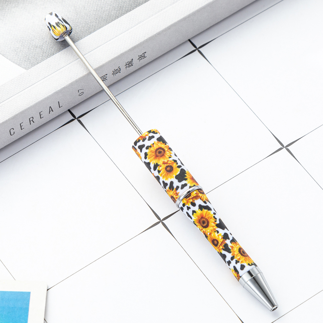 Pluma de cuentas de plástico bricolaje creativo hecho a mano estampado de leopardo pluma floral de cuentas de vaca impresión al por mayor nueva pluma de cuentas de plástico