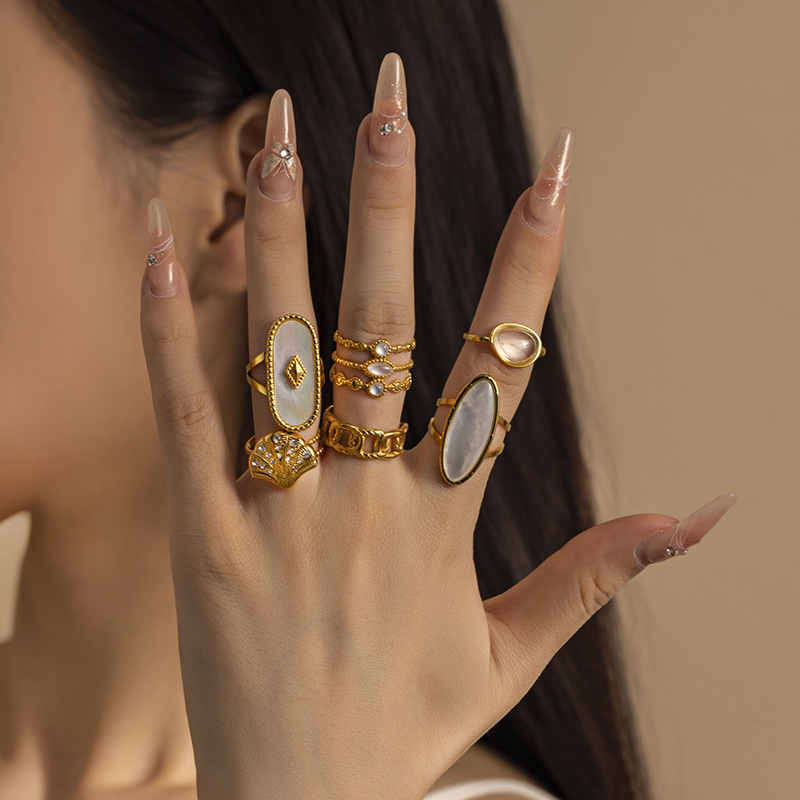 Anillo de acero inoxidable transfronterizo TENA mujeres no decolor temperamento elegante nicho ligero lujo anillo de acero de titanio de oro 18k