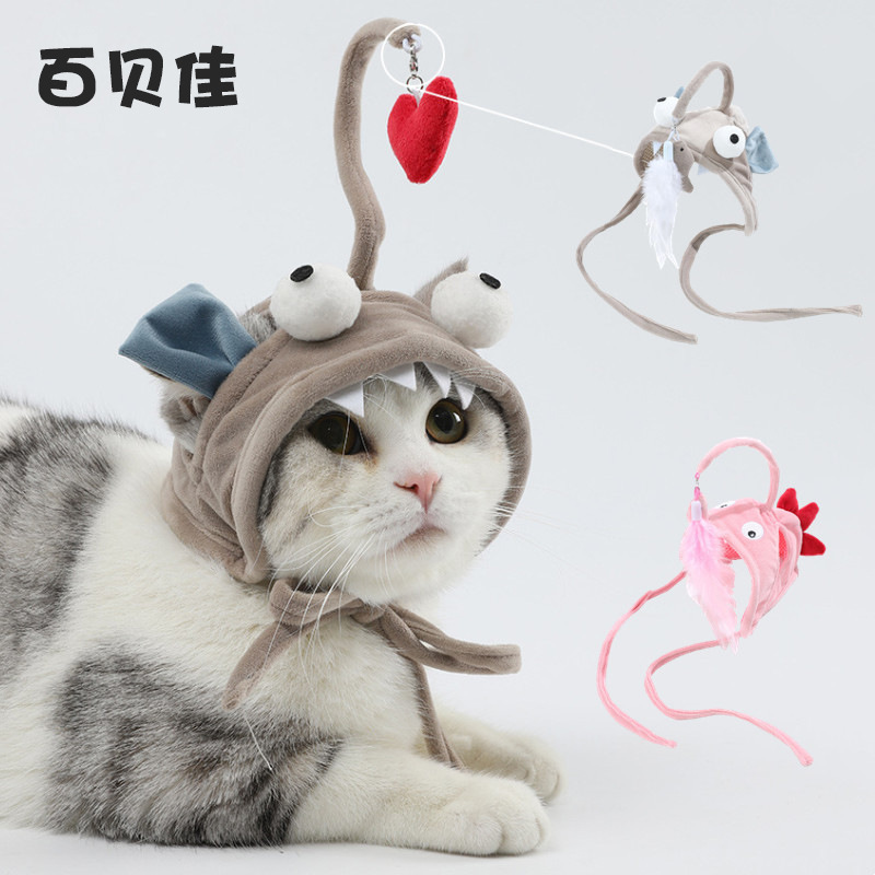 도매 창조적 인 머리 착용 깃털 재미 고양이 스틱 작은 공룡 고양이 헤드 기어 재미 회색 큰 눈 물고기 고양이 자기 안녕 장난감