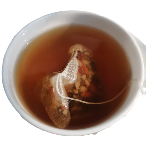 Tea bags in triangular packaging, various combinations of loose-leaf tea, fruit tea, health tea bags from manufacturers for retail.