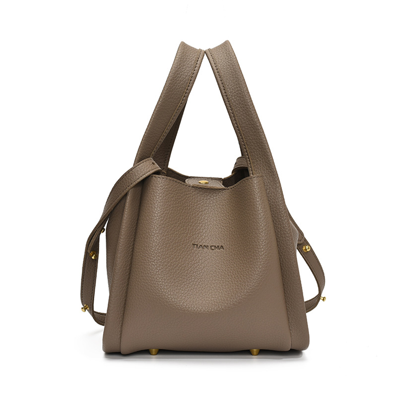 Bolso de cesta de verduras portátil más vendido transfronterizo para mujer 2025 nuevo bolso de mensajero versátil de alta gama bolso de cubo simple casual