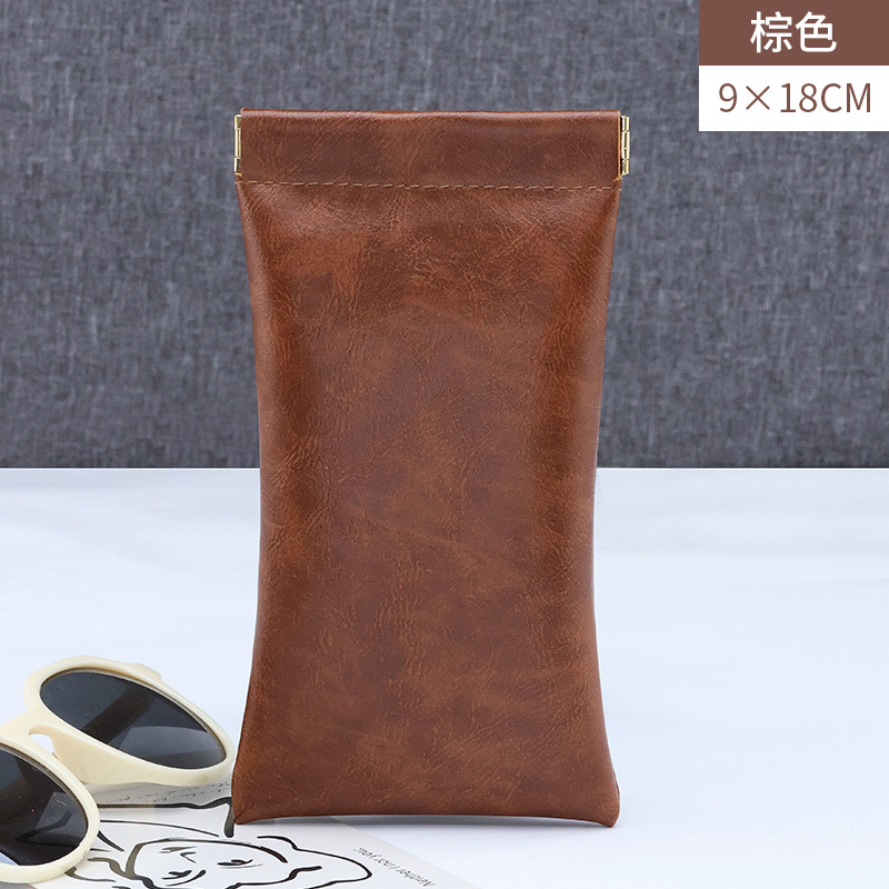 Cerrado automáticamente nuevo conjunto de almacenamiento de gafas de sol bolsa de gafas de cuero al por mayor gafas de sol bolsa de almacenamiento de gafas de metralla