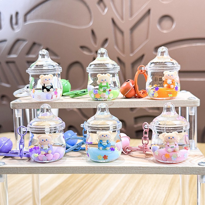 Cartoon Dream Bear Girl Keychain leche rosa muñeca adorable bolso de pareja colgante pequeño regalo al por mayor