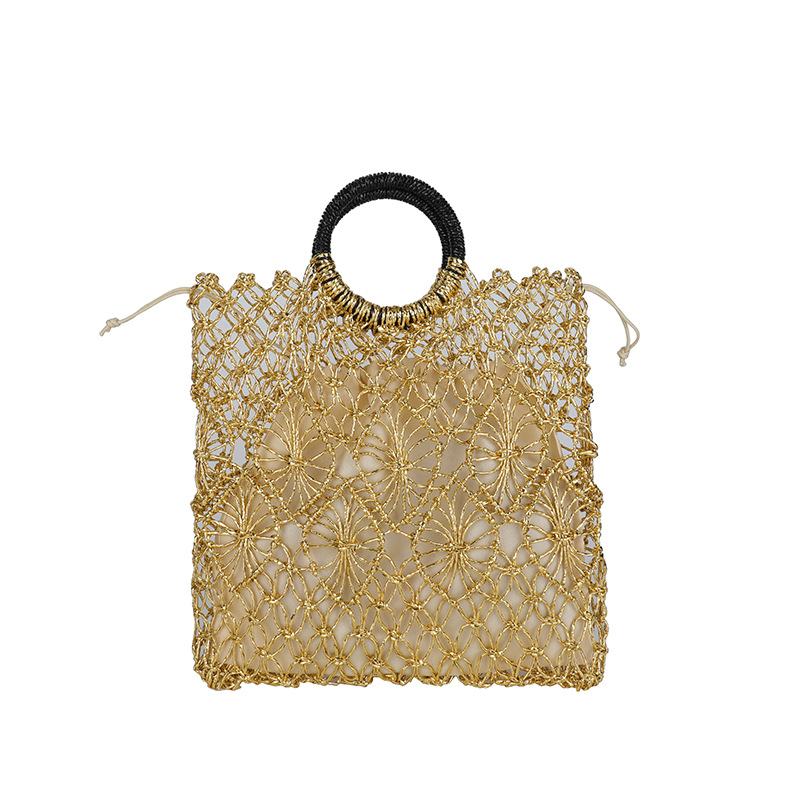 Bolso de vacaciones junto al mar 2025 verano nuevo bolso femenino bolso de playa de estilo occidental bolso tejido hueco de gran capacidad