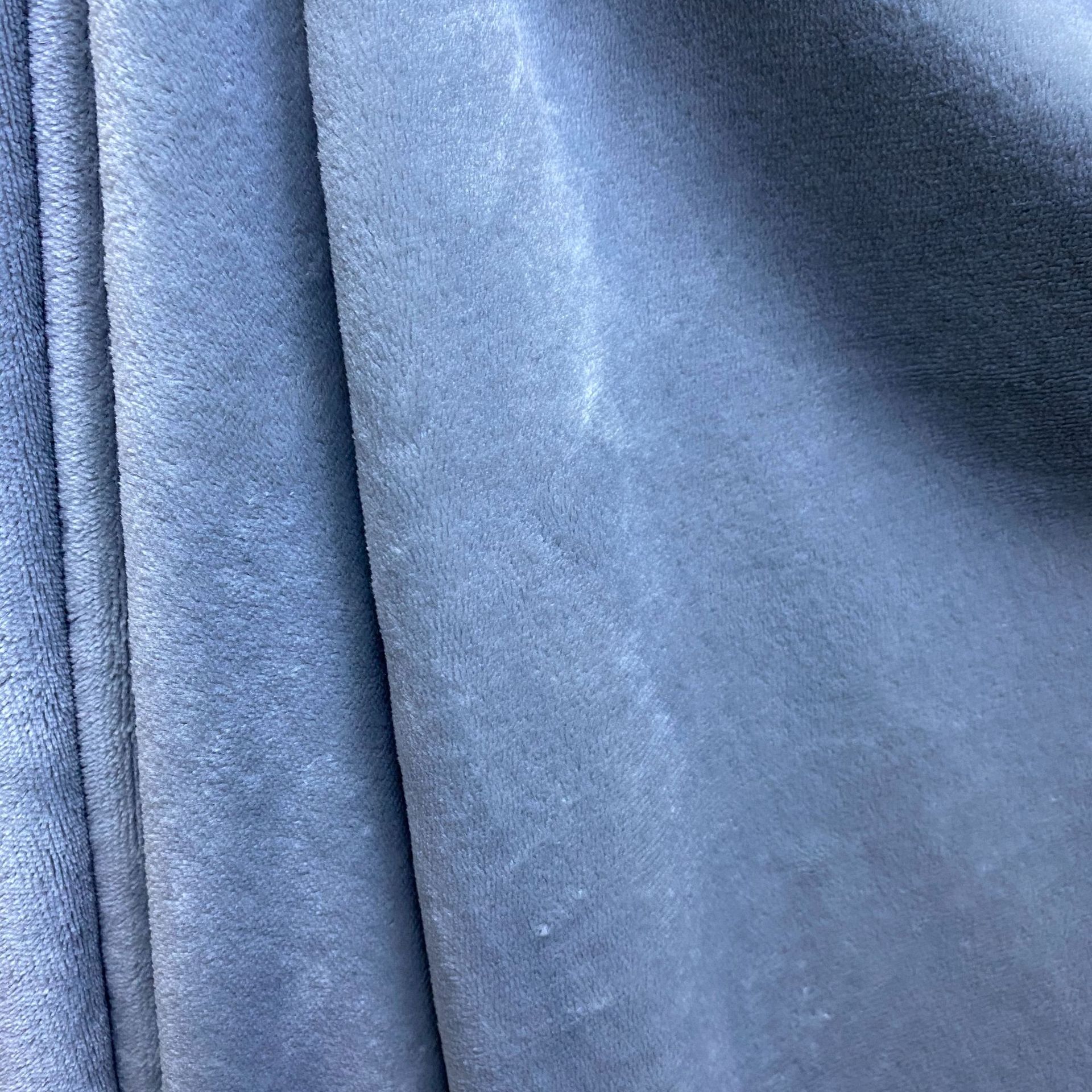 Inventario poliéster de doble cara de flanela de agua cascada pijama simple almohada tela de flanela al por mayor