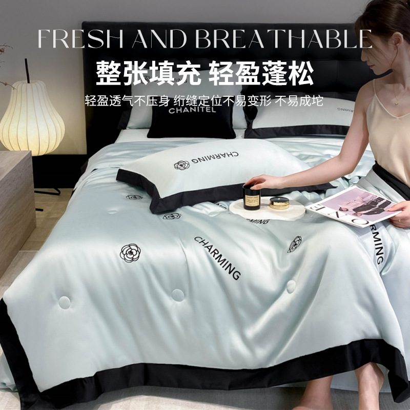 Seda de hielo de lujo ligero, edredón fresco de verano de cuatro piezas, nuevo estilo de verano, edredón de aire acondicionado lavable a máquina, edredón de verano individual