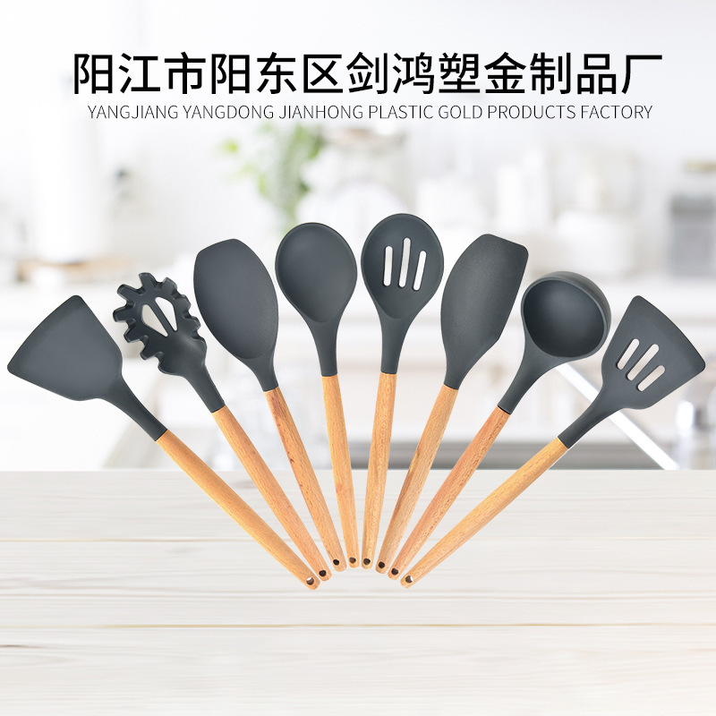 Wooden handle silicone kitchen utensils...