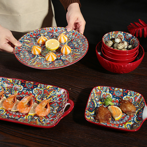 Selected Bohemian-style deep red ceramic tableware, exotic underglaze painted plate with handle, rice bowl, tree pattern soup bowl