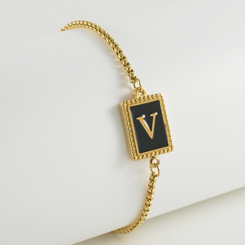 La moda europea y americana transfronteriza del acero inoxidable 26 pulsera inglesa de la letra en relieve pulsera Titanium de la cremallera del acero 18K de la frontera para las mujeres