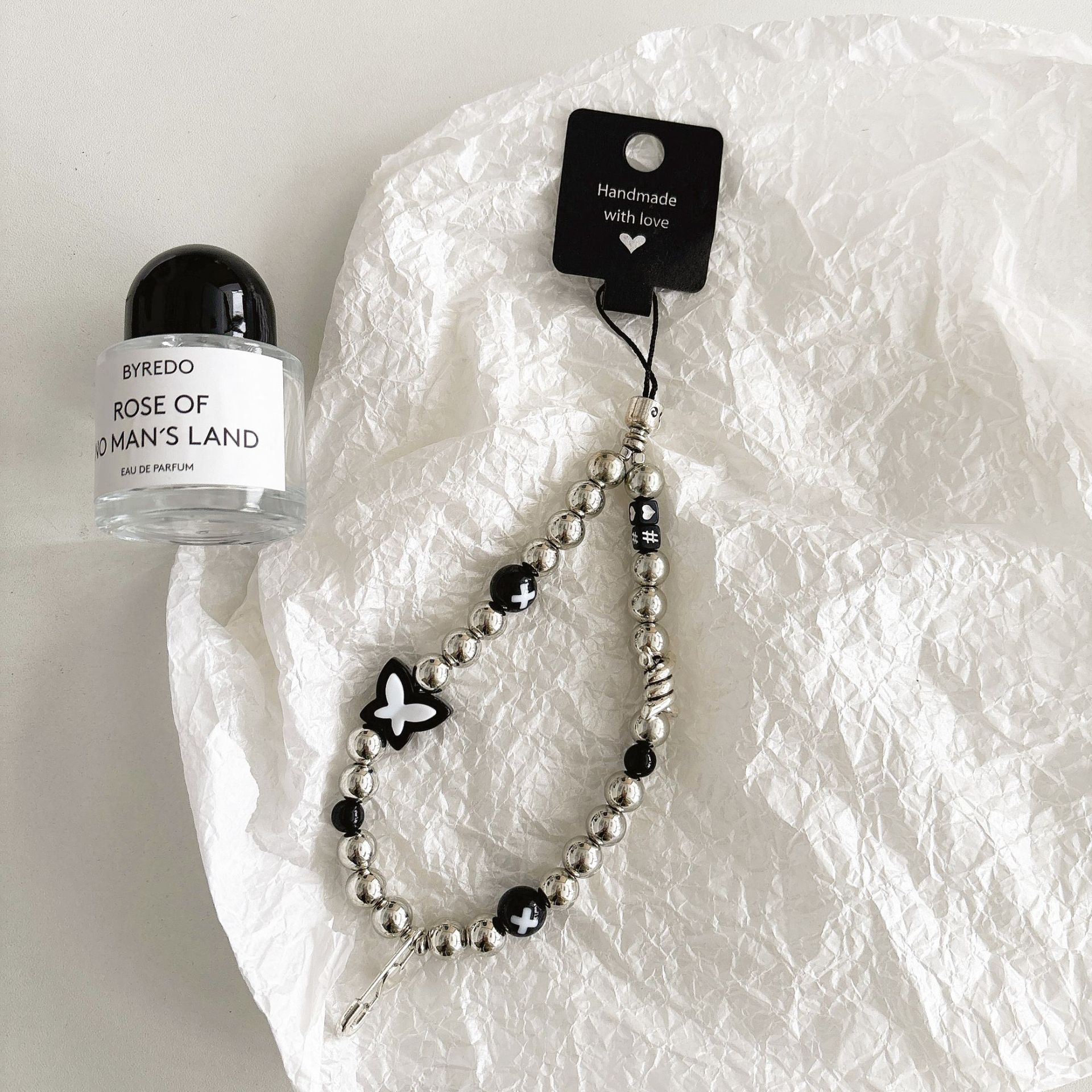 Cuentas de perlas hechas a mano, cadenas de teléfonos móviles, bolsos, colgantes, colgantes de muñeca, cuentas hechas a mano.