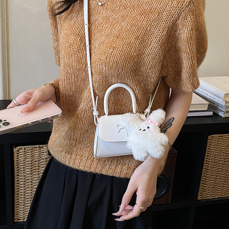 Bolsos infantiles transfronterizos dulces lindos arcos bolsos de mano de niña mini oso colgante bolsos de hombro