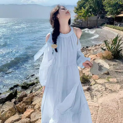 フランスの優しさは首の袖なしのワンピースの婦人服の夏の小さい背の気質のベストスカートの海辺の長いスカートのスカートを掛けます。