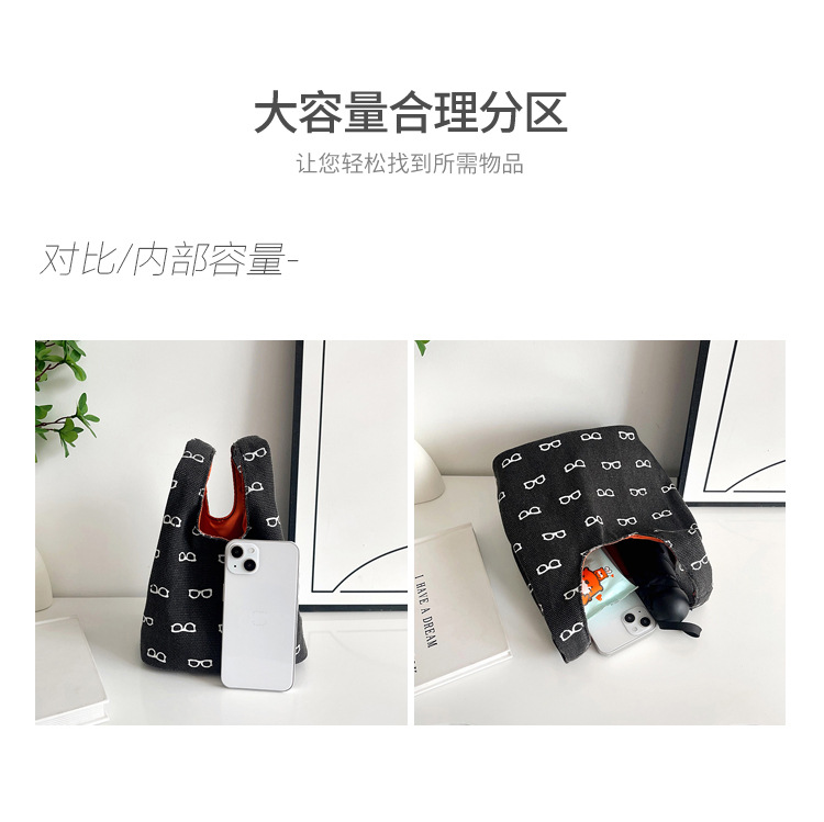 2025 New canvas handbag, a popular female cartoon bucket bag, versatile for Japan and South Korea, and an ins hand-held tote lunch box bag undefined