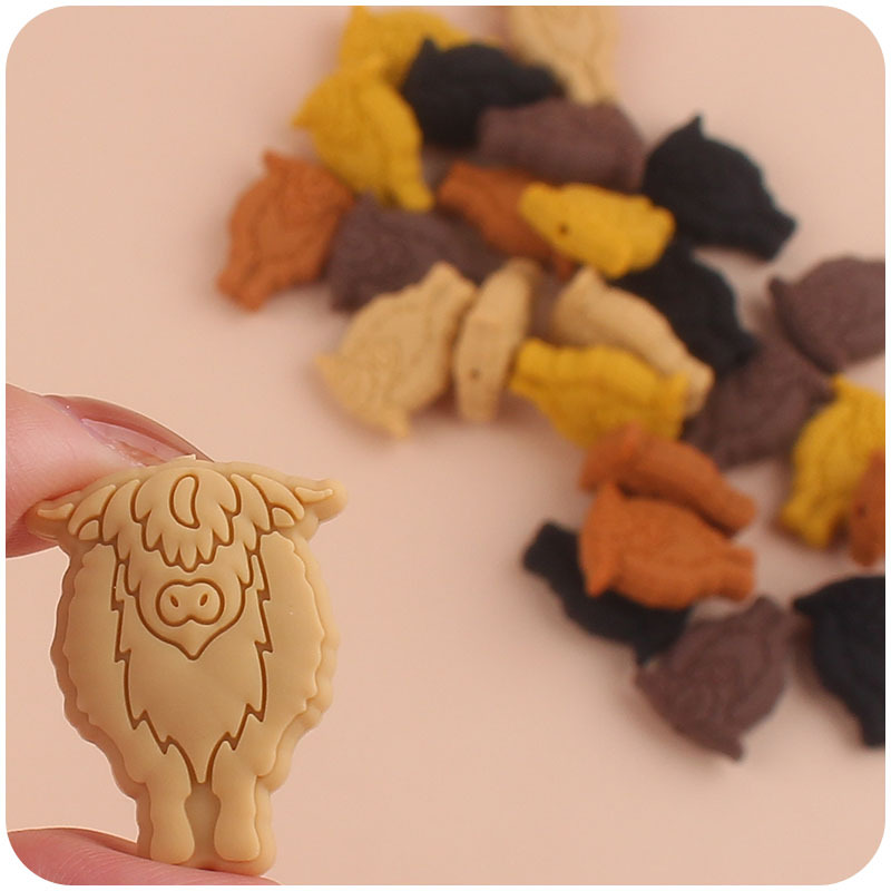 Nuevo bebé suministros de dibujos animados vaca pequeño mordedor creativo DIY bebé molar Cadena de pezón cadena anti-gota accesorios pequeños