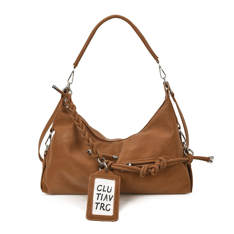 Bolsa de viaje transfronteriza de gran capacidad para mujeres 2025 nuevo estilo coreano de hombro casual bolso de brazo de alto nivel sensación de mochila