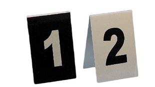 The black and white evidence plate is photographed at the scene. The evidence plate numbers the evidence.