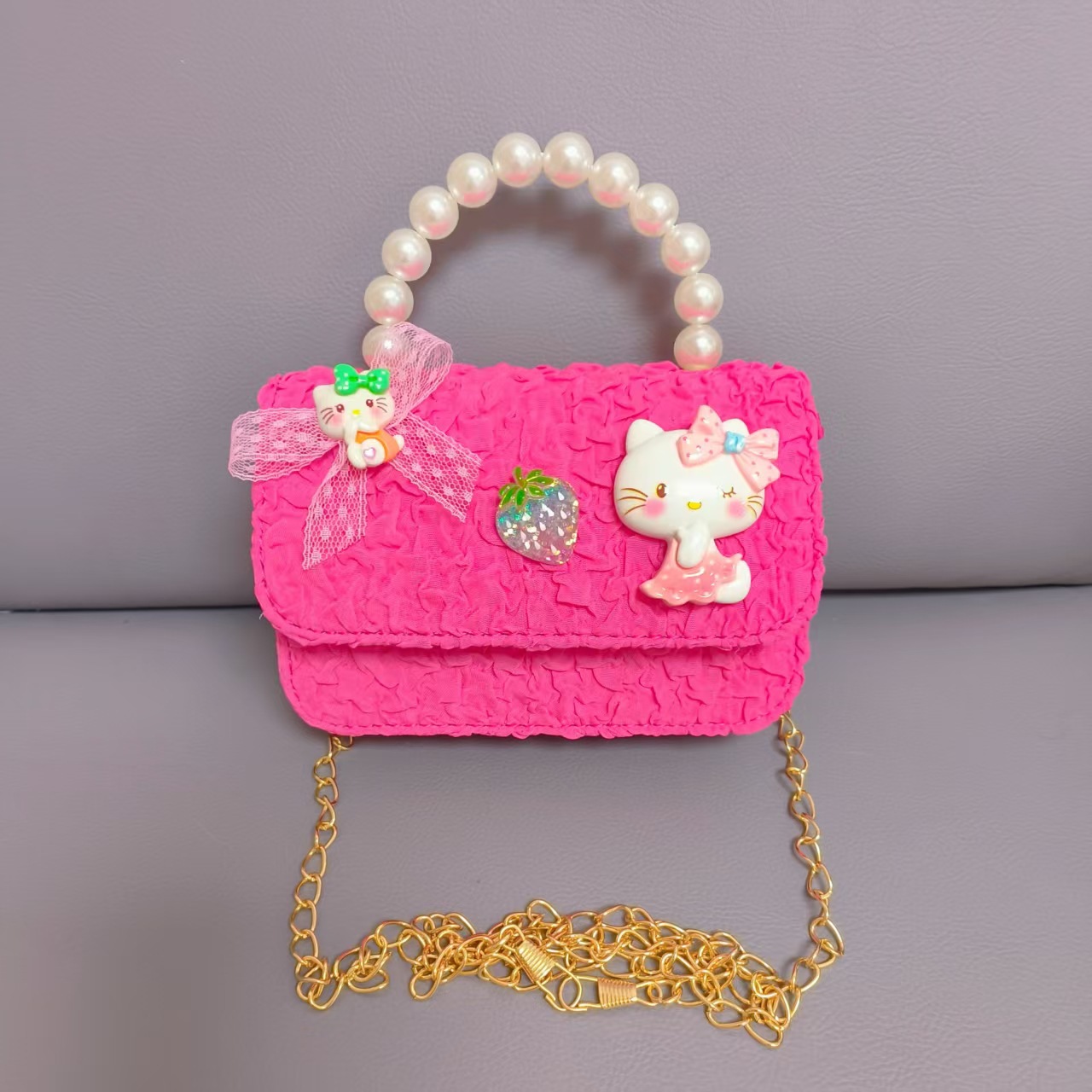 Bow Pearl Princess Handbag Meileti Kulomi Girl Año Nuevo Cartera pequeña bolsa de cadena de viento fragante