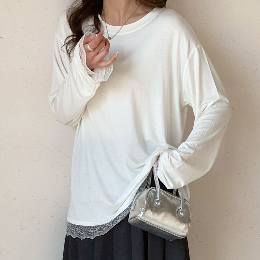 Diseño de la camisa de fondo con costuras de encaje de todo fósforo 2024 otoño e invierno nuevo estilo lijado adelgazante top temperamento de moda femenina