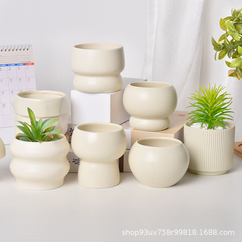 Pot de cerámica crema INS lujo ligero de alto nivel sensación de plantación de orquídeas mariposa simple orquídeas plantación de pot de porcelana blanca Dehua