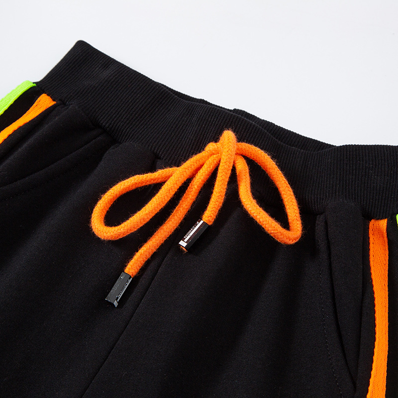 Pantalones deportivos para niños, estilo coreano, primavera y otoño 2026, pantalones de chándal para niños, pantalones largos de punto con tres rayas, venta al por mayor