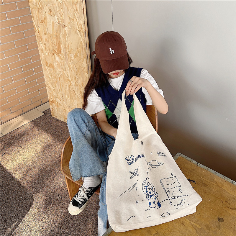 【 In Stock 】13173 Cute Moon Landing Cow single-shoulder Bag, student girls' schoolbag, canvas bag, large capacity wholesale undefined