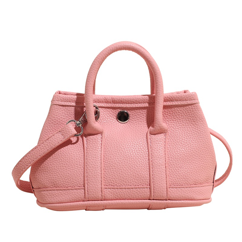 Bolsa de cubo de mano popular de verano para mujeres 2025 nuevo bolso de hombro super caliente universal nicho super caliente mochila