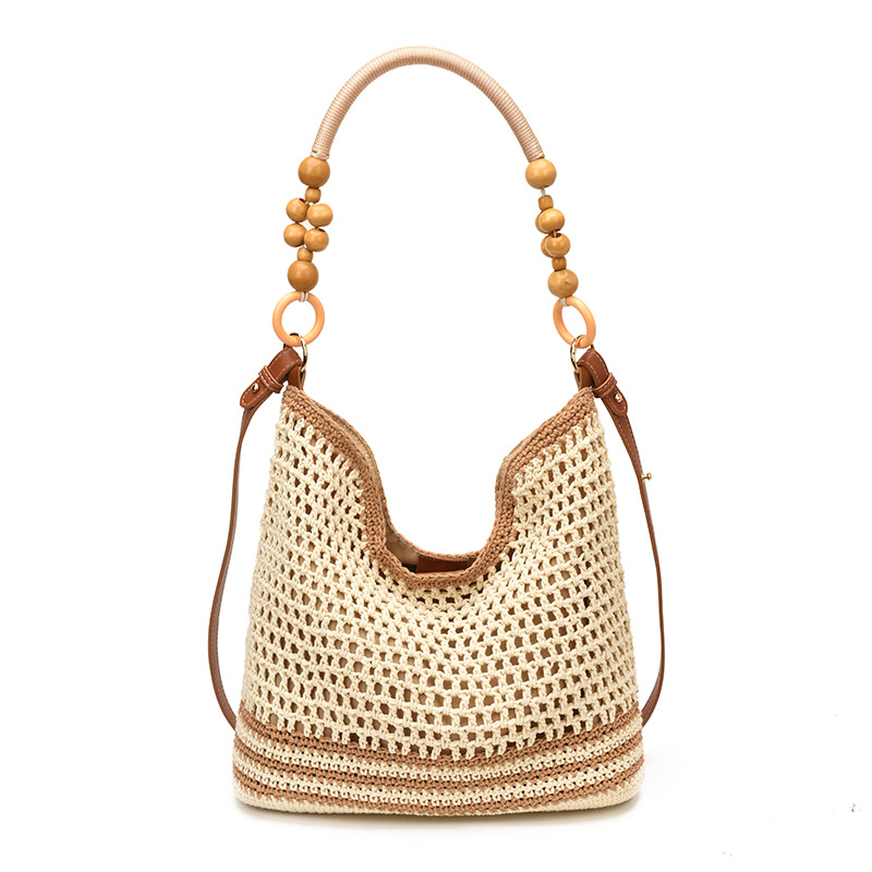Bolsas de gran capacidad de tejido hueco para mujeres 2026 nuevas bolsas de playa de vacaciones en la playa de viaje nicho brazo Tote image 9