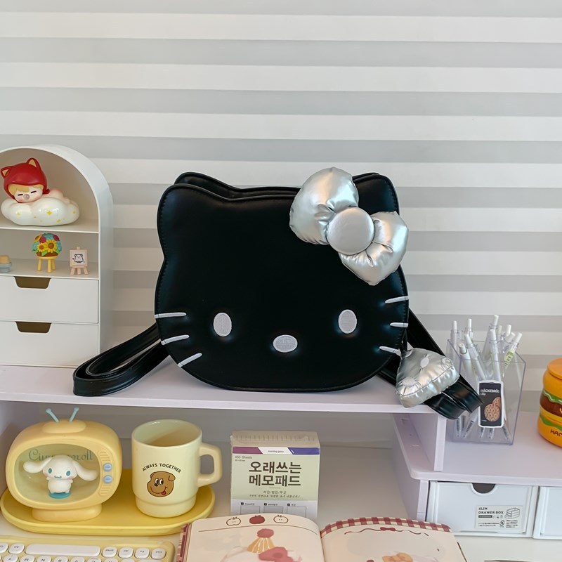 アニメのかわいい蝶結びの子猫の定型的なリュックサック2025の新型の個性は街の少女の心のリュックサックのプレゼントを出します。|undefined