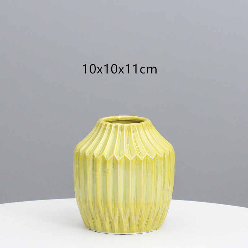 Florero de cerámica al por mayor creativo ins hogar estilo europeo del Norte simple rayado creativo Luz de lujo decoración de arte al por mayor