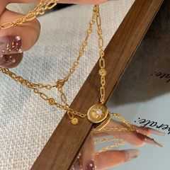 フランスのレトロなchokerの小さいデイジーのネックレスは軽くて豪華で高級感があります。