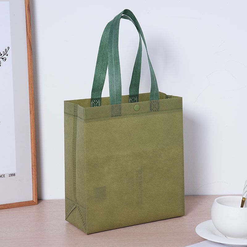 Bolsa de mano no tejida con botón tienda de ropa tienda de gafas bolsas de té bolsas de regalo de compras personalizadas LOGO impreso