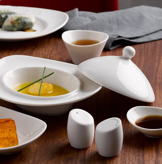 Transfronterizo de la cola de la perla de cerámica simple cubiertos blancos cálidos de forma especial platos domésticos platos de sopa platos cucharas