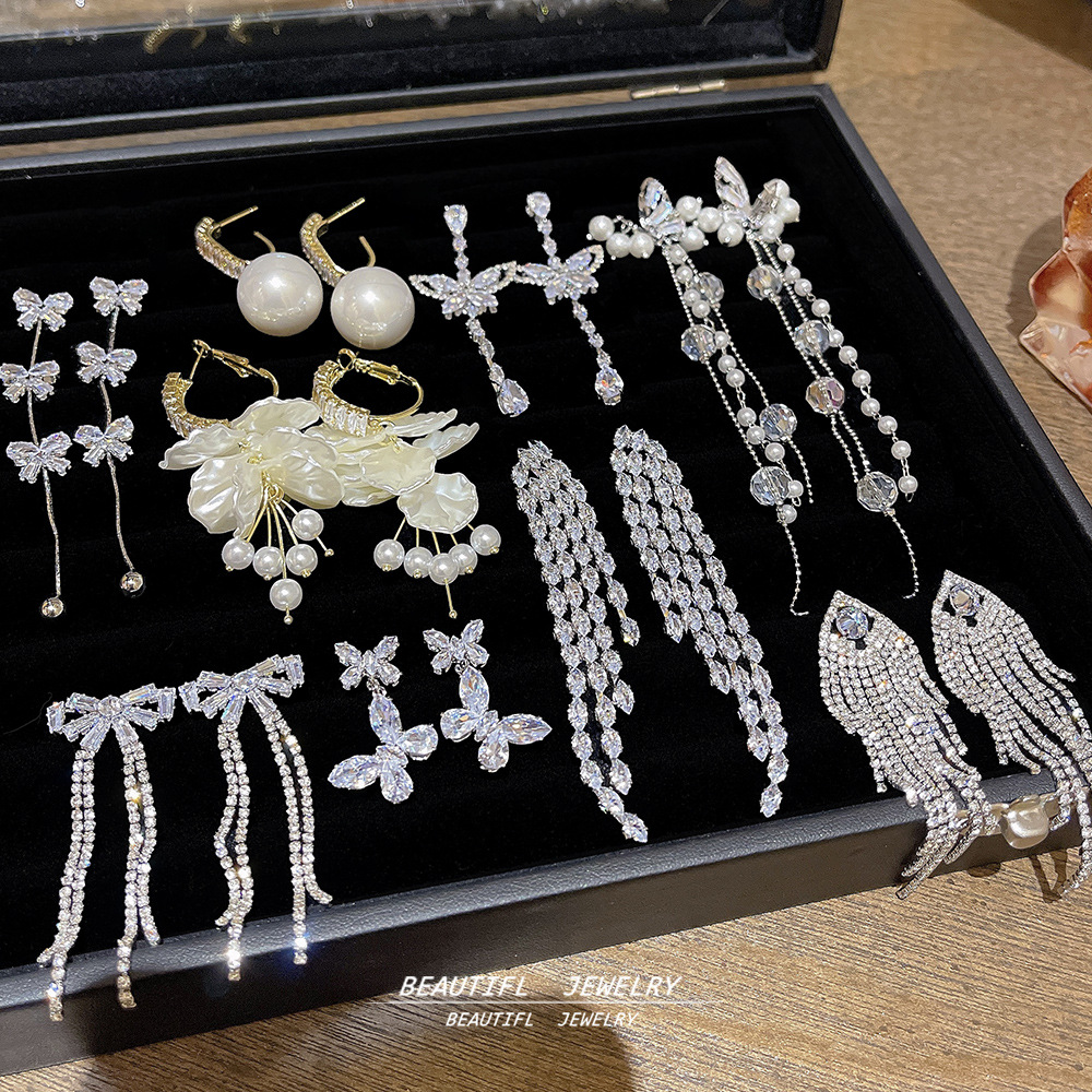 S925银针锆石流苏耳环轻奢高级感小众设计感耳坠新款大气夸张耳饰