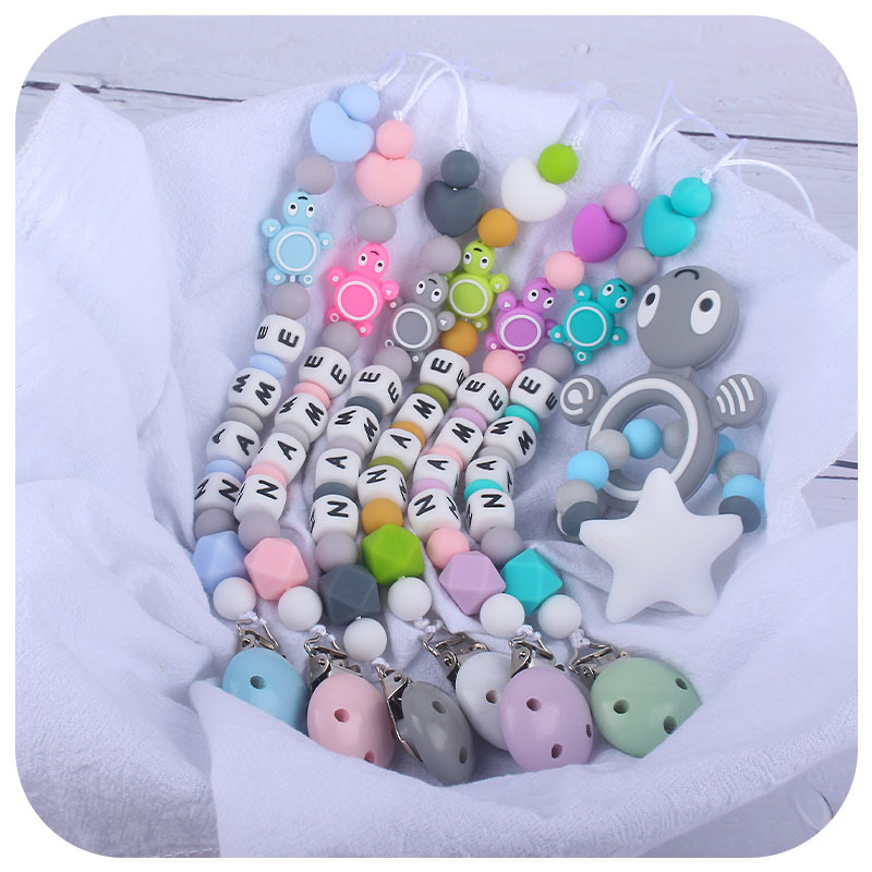 Suministros de bebé calmante Cadena de chupete de silicona bebé DIY Nombre de producción de silicona tortuga cadena anti-gota Comercio exterior Nuevo