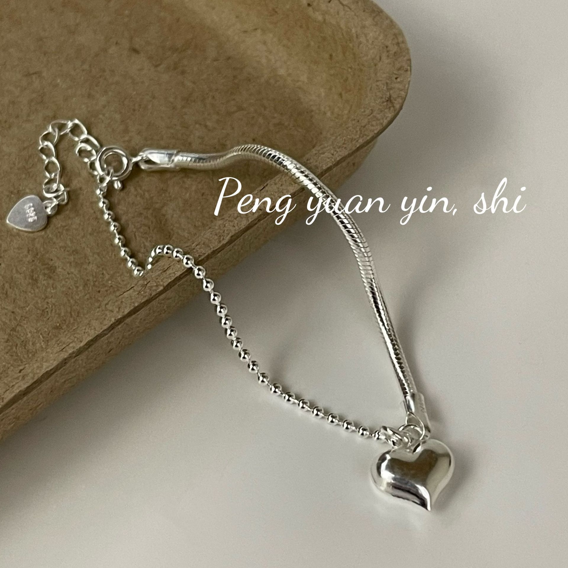 Bracciale a forma di cuore in argento sterling per donna, stile Niche Ins, design asimmetrico, leggero, sensazione di alta qualità, coreano_voghion.com