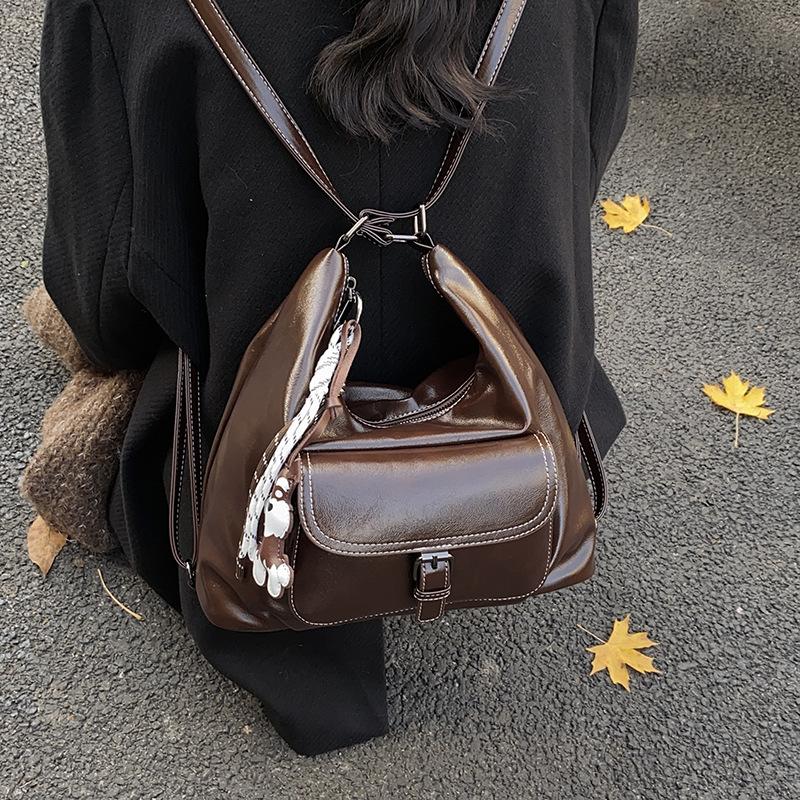 Vintage Maillard brazalete, mochila de mujer, invierno 2024 nuevo estilo simple de hombro de gran capacidad.