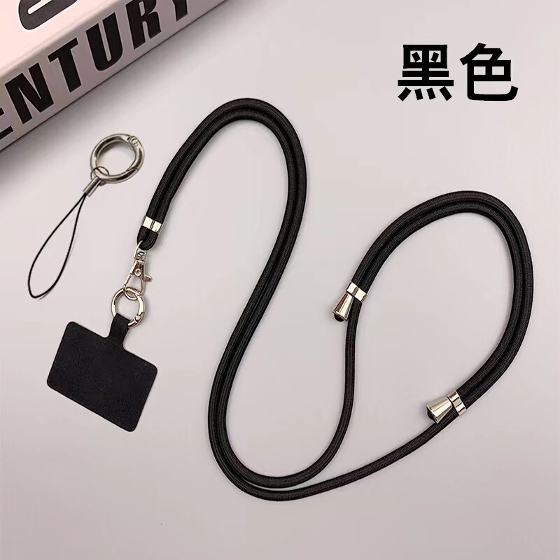 携帯電話のストラップの首が斜めにまたがっています。|undefined