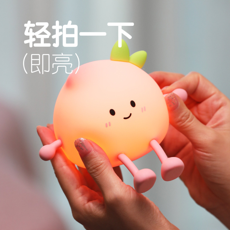 新型のかわいいお尻の桃の小夜の明かりの七色は定時の携帯電話のスタンドの柔らかい光の女性の贈り物をたたいて寝ている雰囲気の明かりに付き添います。|undefined