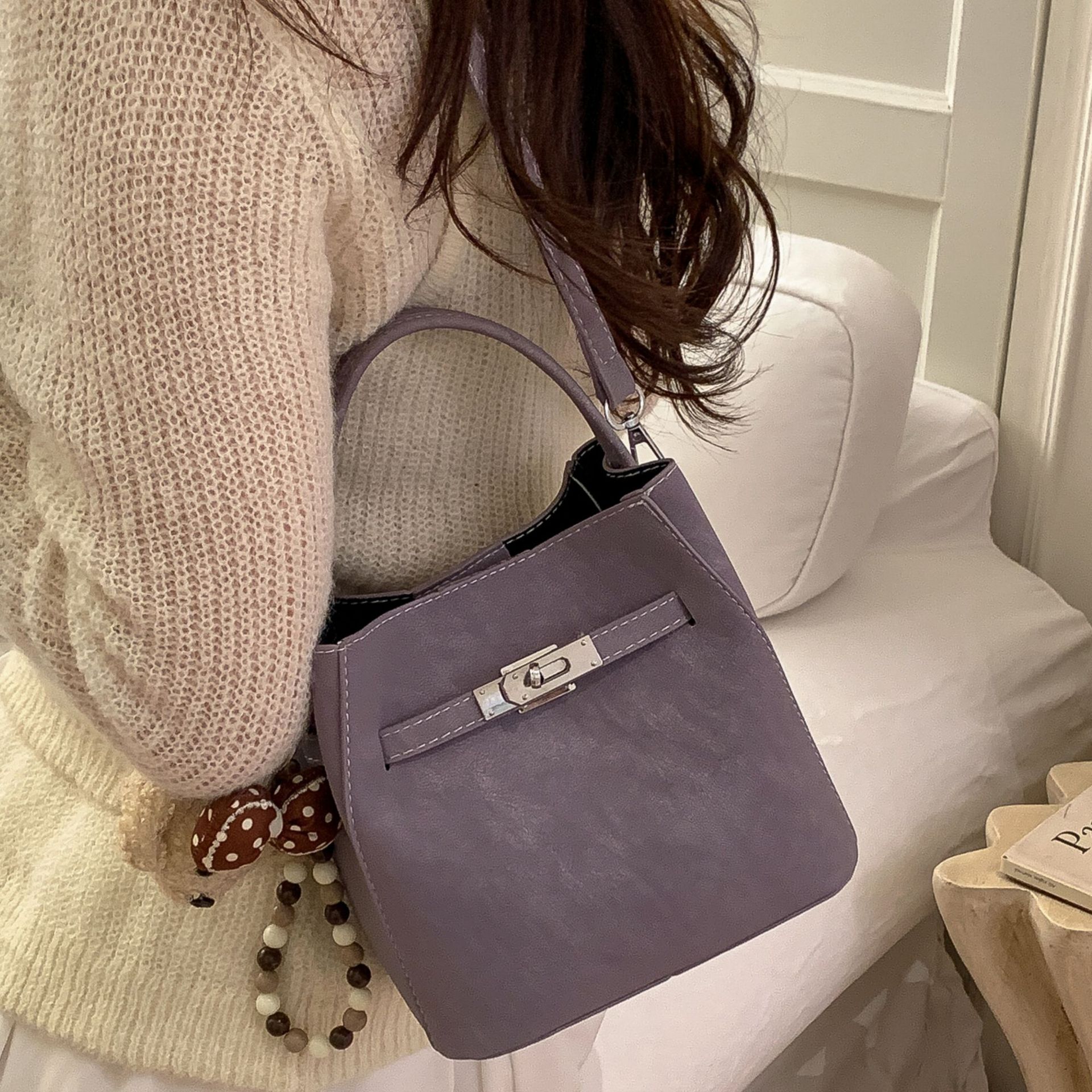 Cross-border 2026 nuevo estilo coreano nicho Zhong bolso de cubo de agua super caliente mujer de viaje universal temperamento casual mochila diaria