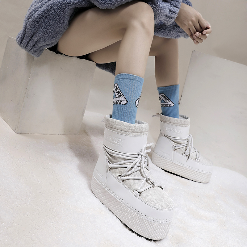 Botas lunares para padres e hijos de copos de nieve de nueve colores, suela gruesa fea y linda, manga de esquí cálida, venta al por mayor de una pieza