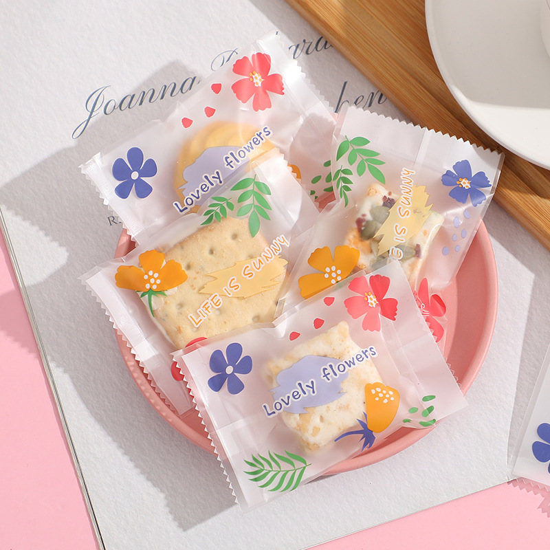 Frosted copo de nieve crujiente bolsa de embalaje hornear postre galleta pequeña bolsa de galletas dulces leche Jujube beef biscuit machine Seal bolsa