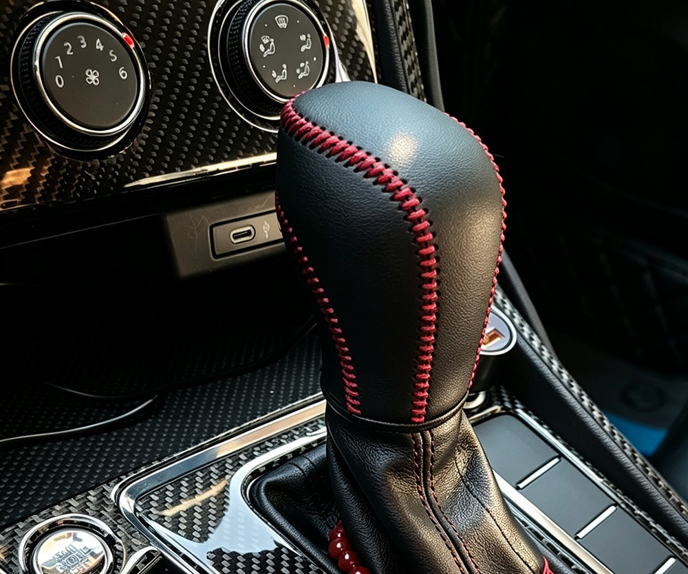 Car gear shift knob cover for Volkswagen 2012 Tiguan, Magotan, Bora, Lavida, and Sagitar; hand-stitched gear shift cover and handbrake cover