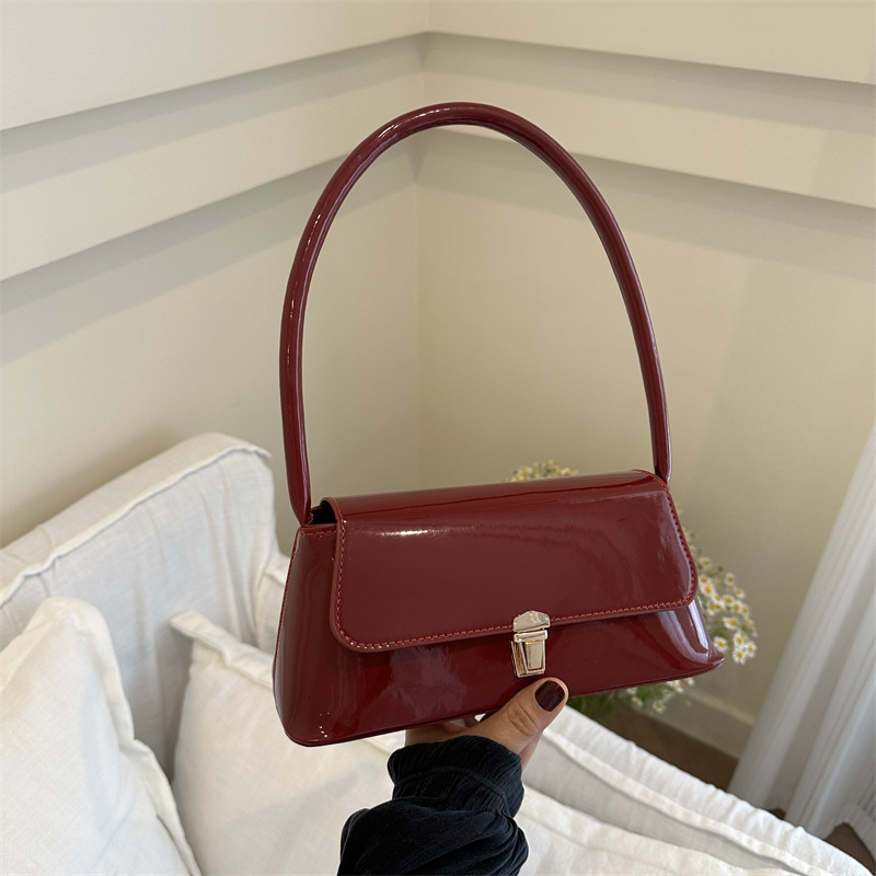 Temperamento simple bolso de hombro de bloqueo de color sólido para mujeres 2024 primavera y verano nuevo nicho de alta calidad bolso de brazo bolso de mujer