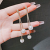 Small design long sophisticated earrings with tassels from pearl, trend of season, wholesale