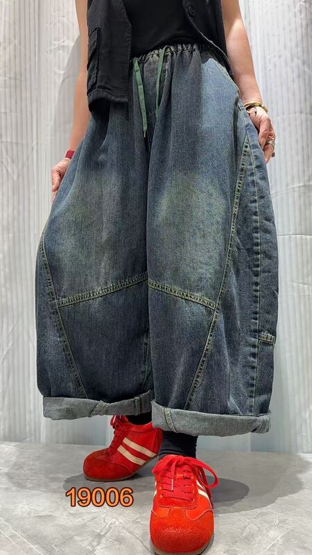 Oversized color-block drawstring jeans, 2026 autumn new style, elastic waist, distressed casual harem pants for trendy women 19006 Oversized color-block drawstring jeans, 2026 autumn new style, elastic waist, distressed casual harem pants for trendy women 19006