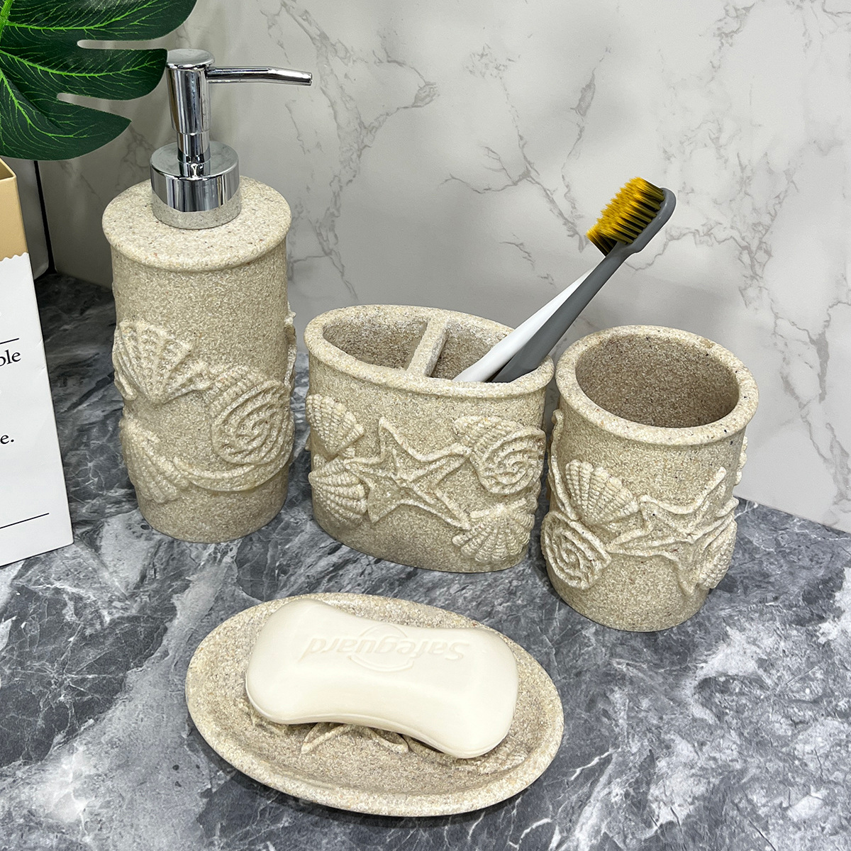 Juego de cuatro piezas de arena y grava